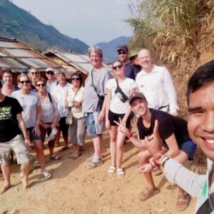 Tour guide with the boat crew, Mekong Slow Boat Cruise
